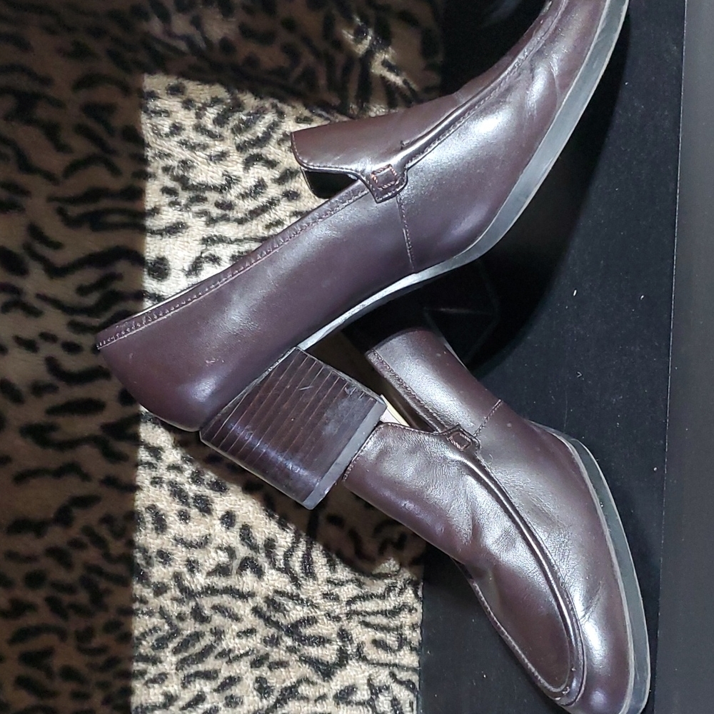 Brown leather wedge shoes.